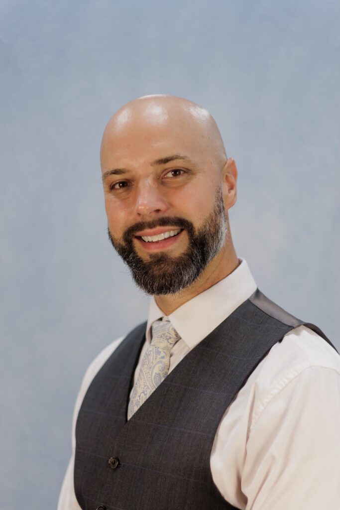 Portrait of john korczynski, music instructor at saint paul's classical school, melbourne florida